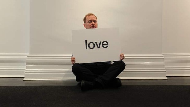 Charles Firth in the gallery with his donated word ‘Love’